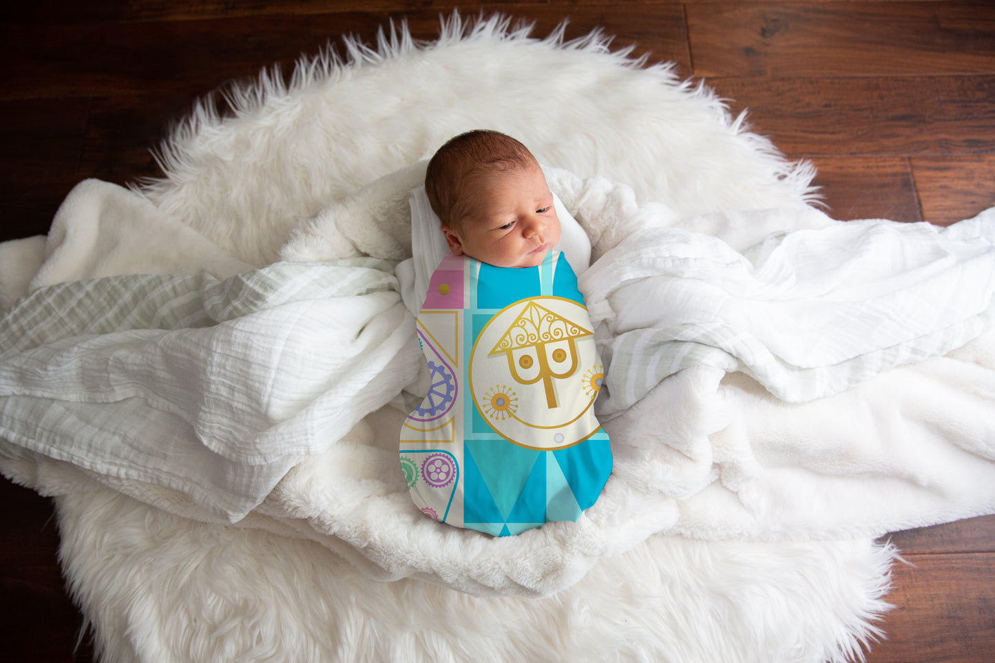 Pastel It's a Small World Swaddle Blanket