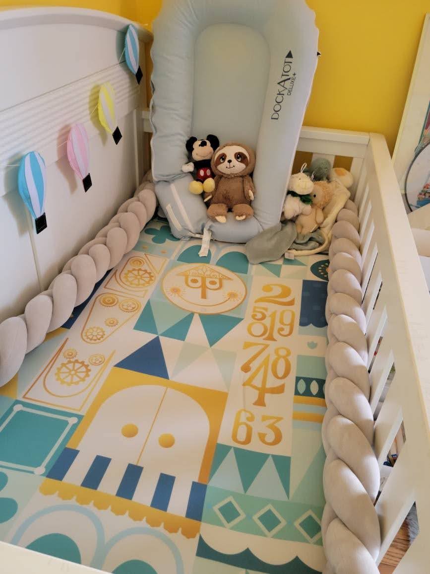 Blue It's a Small World Crib Sheet