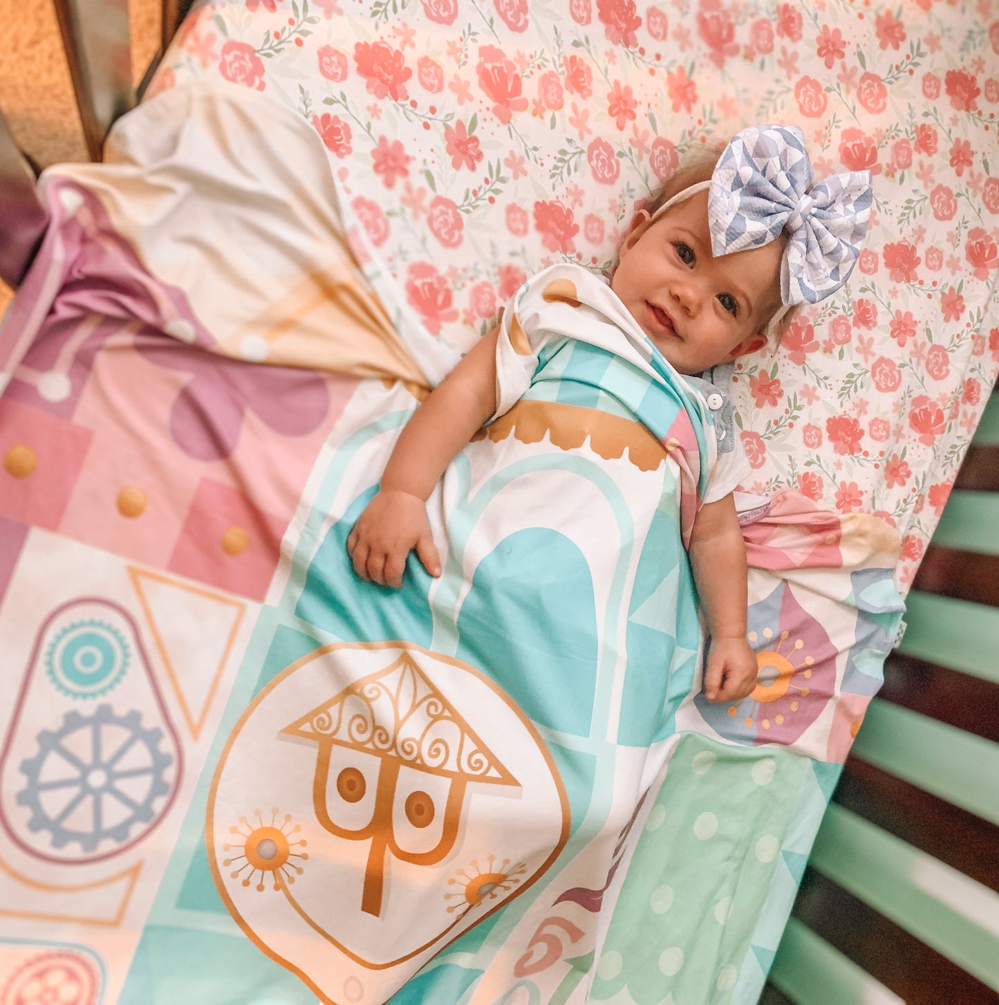 Pastel It's a Small World Swaddle Blanket